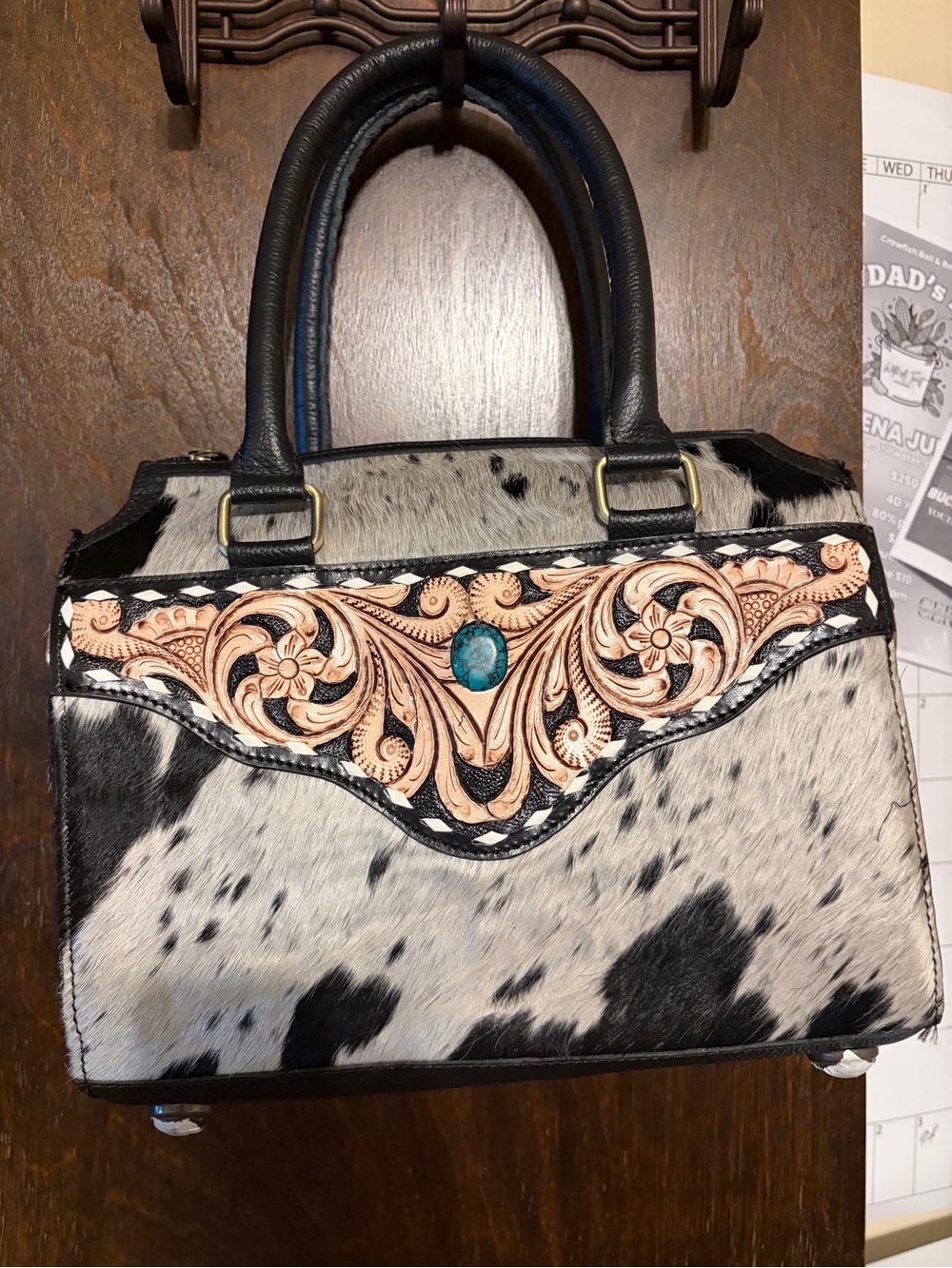 New handbag with cowhide and turquoise embellishment on front